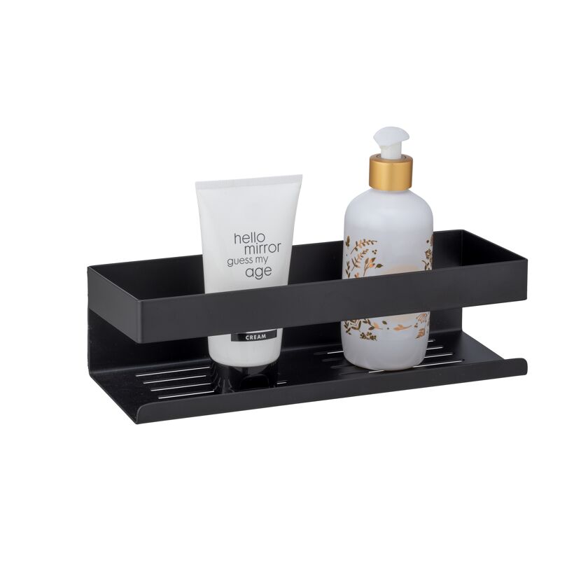 Schwarze Wandablage mit Creme und Seifenspender