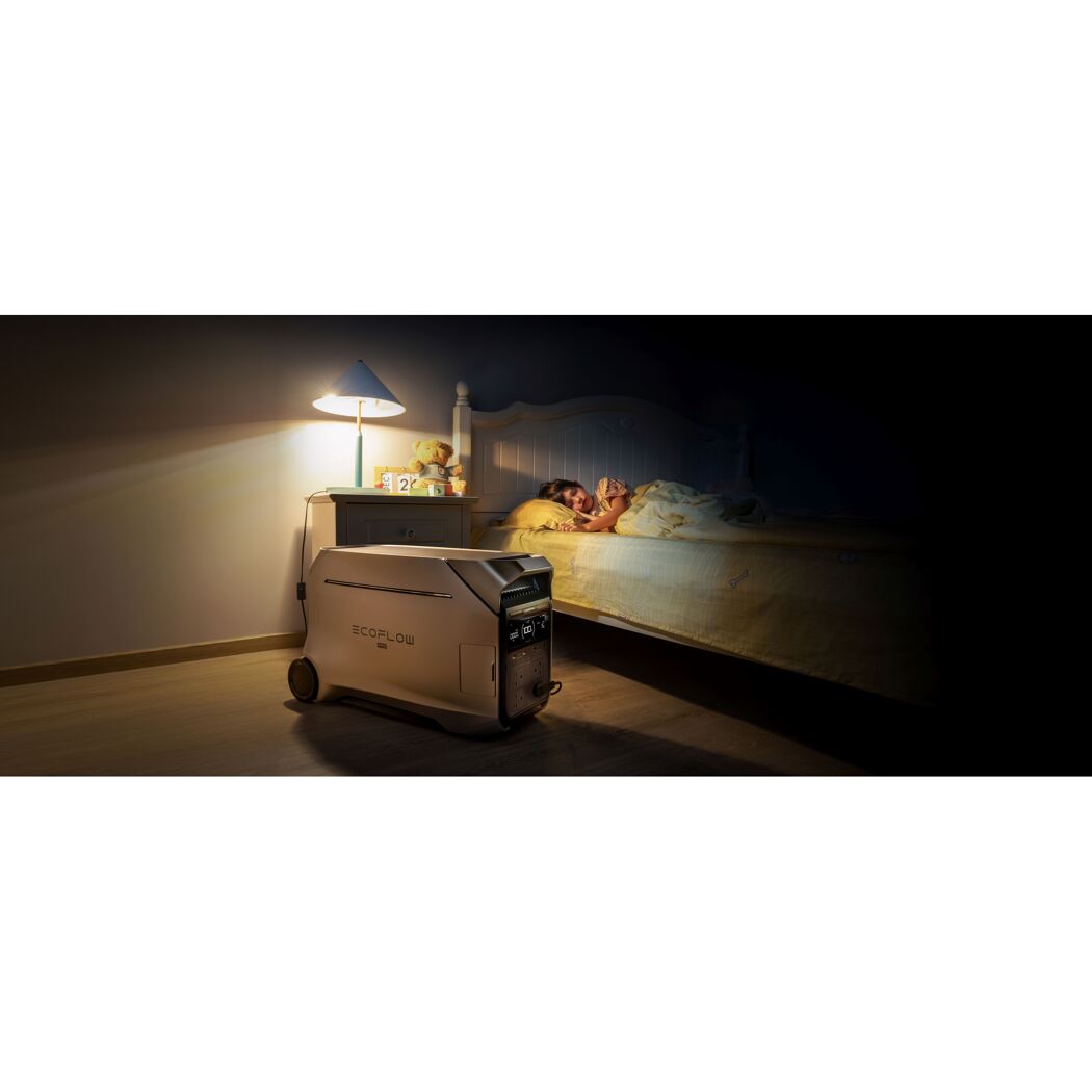 Tragbarer Stromgenerator neben Bett mit schlafendem Kind