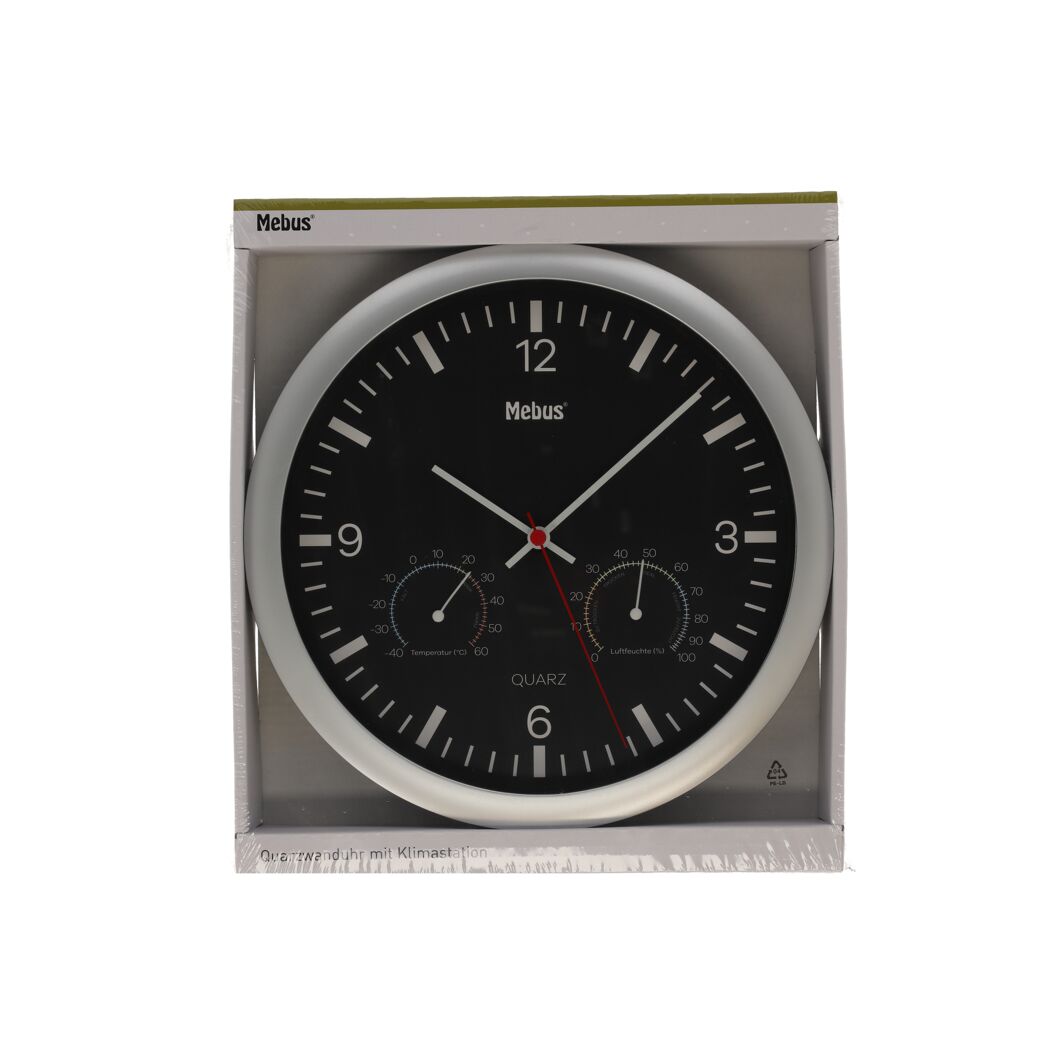 Schwarze Mebrus Quarz-Wanduhr mit Klimastation in Verpackung.