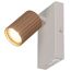 LED-Spot Soka beleuchtet mit beige-braunem, geriffeltem Kopf.