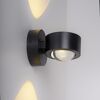 Schwarzer LED-Spot 'Chia' leuchtet warmweiß an der Wand