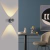 LED-Spot 'Chia' an Wand mit Lichtkegeln