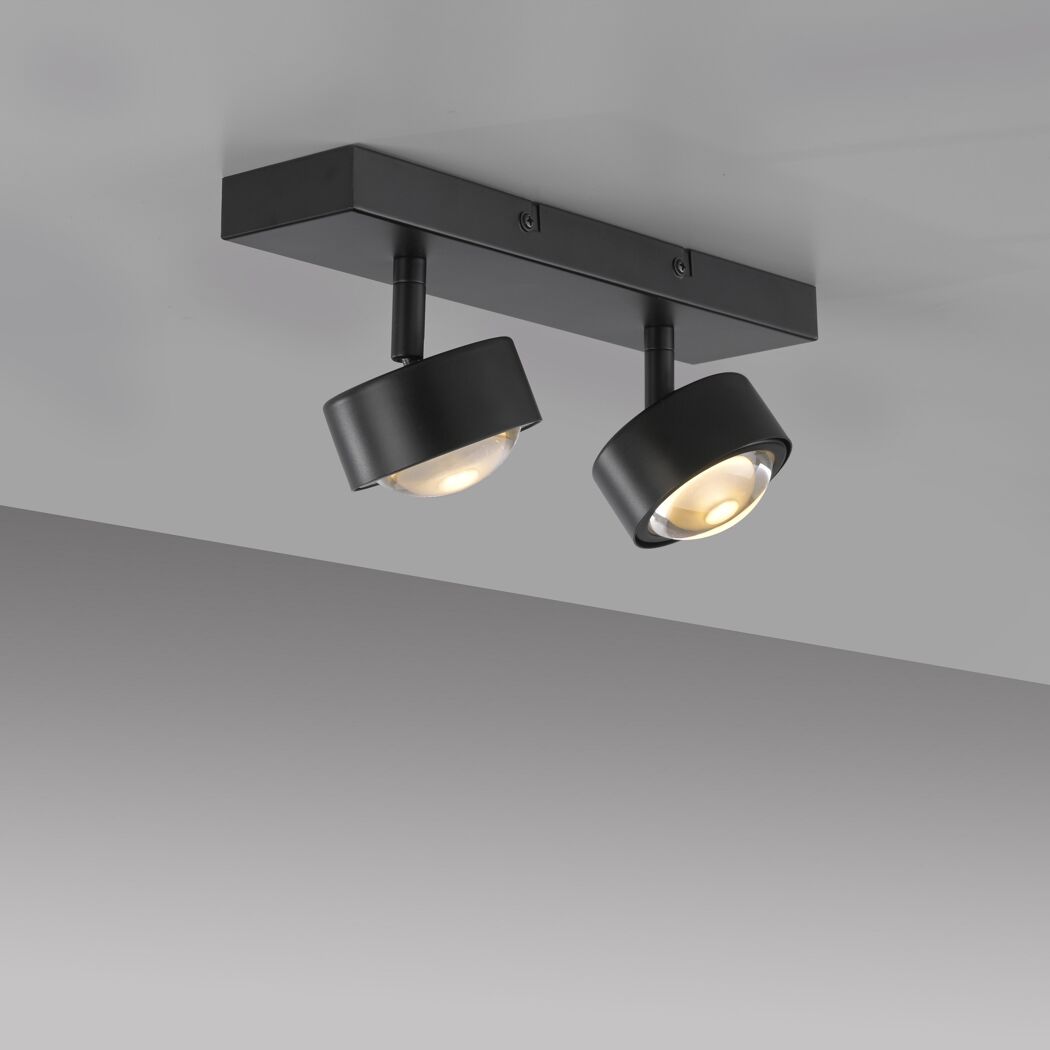 Schwarzer LED-Deckenstrahler 'Kulu' mit zwei warmweißen Lichtkegeln.