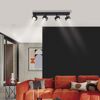 LED-Spot 'Kulu' 4-flammig an der Decke, beleuchtet modernes Wohnzimmer.