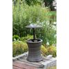 Gartentisch 'Mumbai' mit Weingläsern und Flaschen im integrierten Kühler.