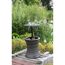 Gartentisch 'Mumbai' mit Weingläsern und Flaschen im integrierten Kühler.