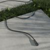 Verbindungskabel f&uuml;r Garten-Lichtsystem auf Gras und Beton