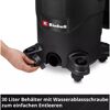 Hand öffnet Wasserablassschraube des Einhell Nass-Trockensaugers