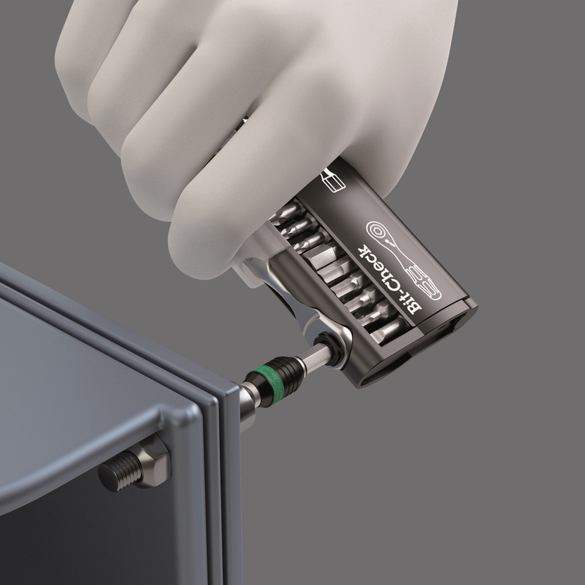 Hand mit Bit-Check Schraubendreher