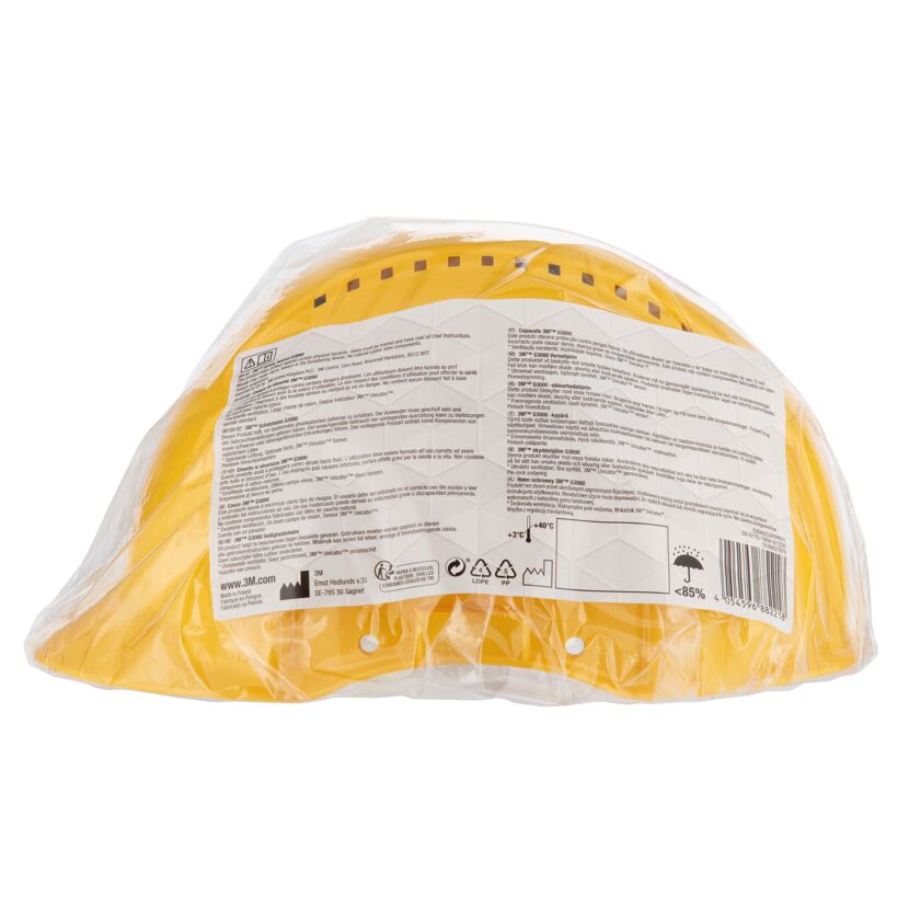 Gelber Schutzhelm in Verpackung