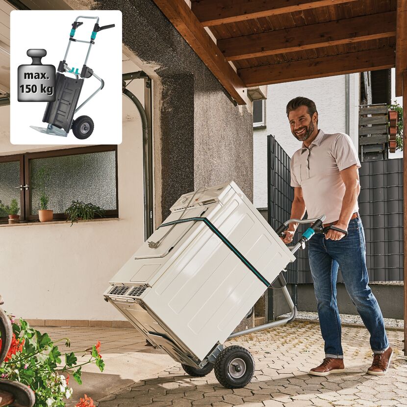 Person transportiert Waschmaschine mit Transportkarre TS 2500.