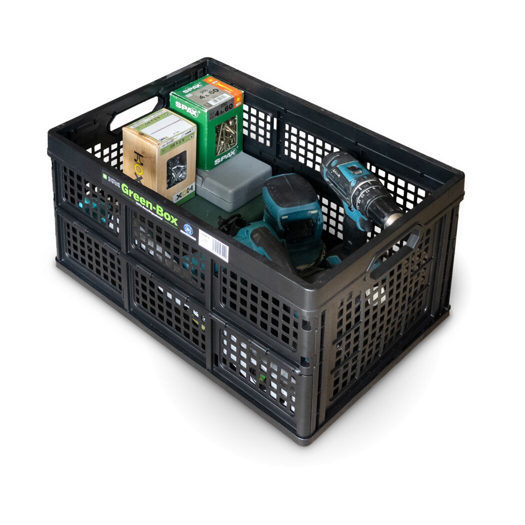 Werkzeug und Schrauben in schwarzer Green-Box