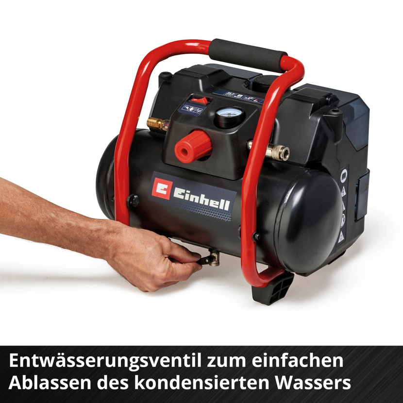 Person betätigt Ventil eines Kompressors