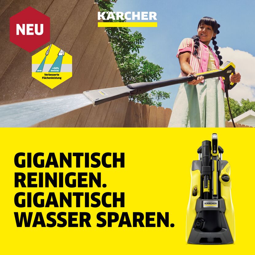 Person reinigt Zaun mit Hochdruckreiniger