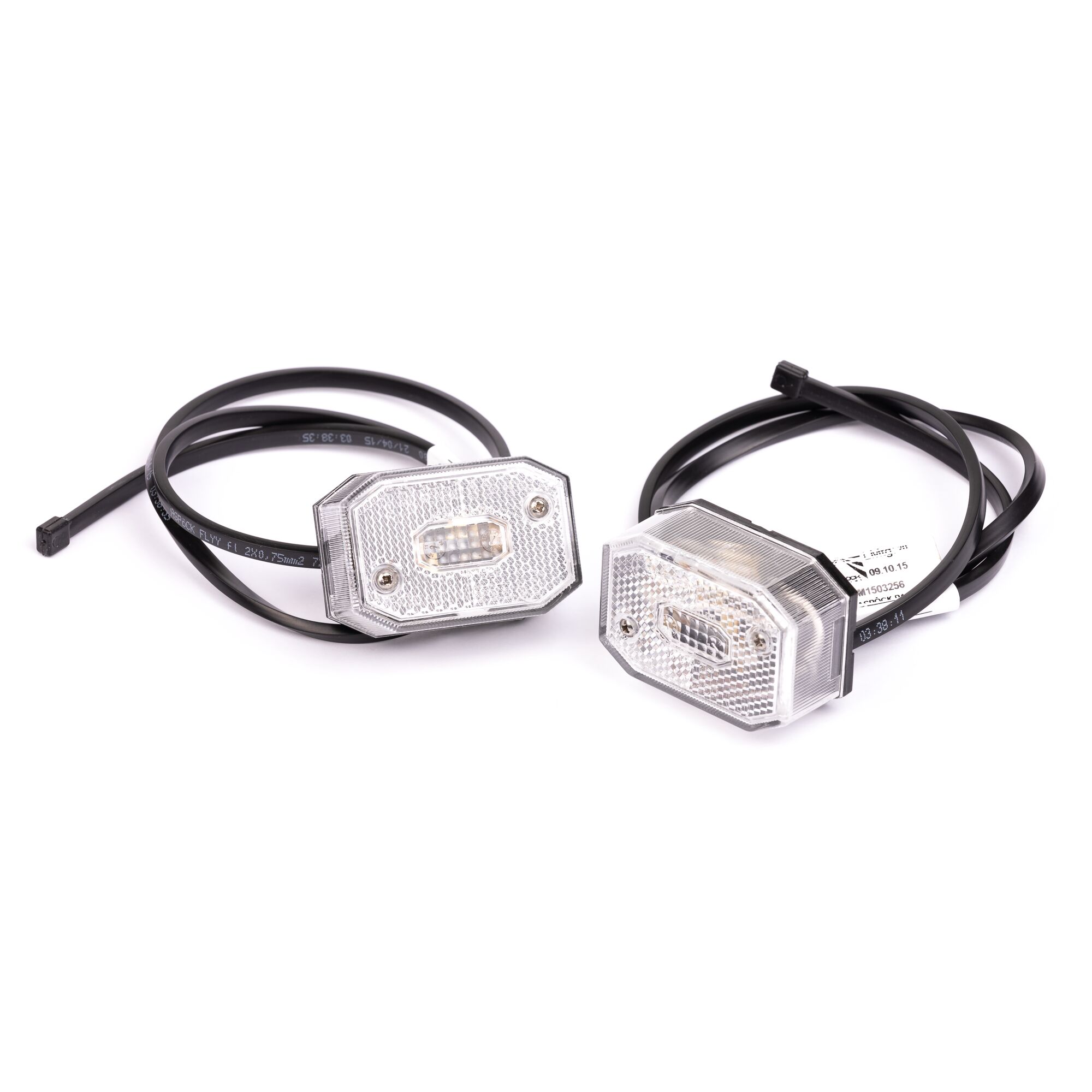 Zwei weiße Begrenzungsleuchten mit Kabeln