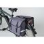 Fahrrad mit grauen Gepäckträgertaschen