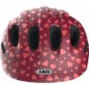 Roter Fahrradhelm mit Herzen