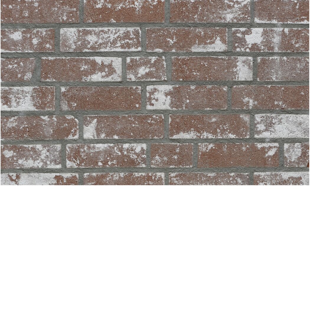Verkleidung aus braunen Riemchen mit weißer Patina