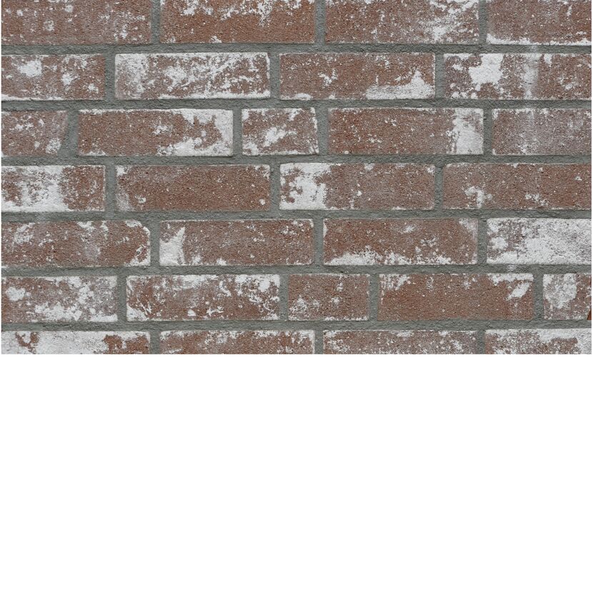 Verkleidung aus braunen Riemchen mit weißer Patina