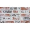Verwitterte, rot-graue Ziegelwand