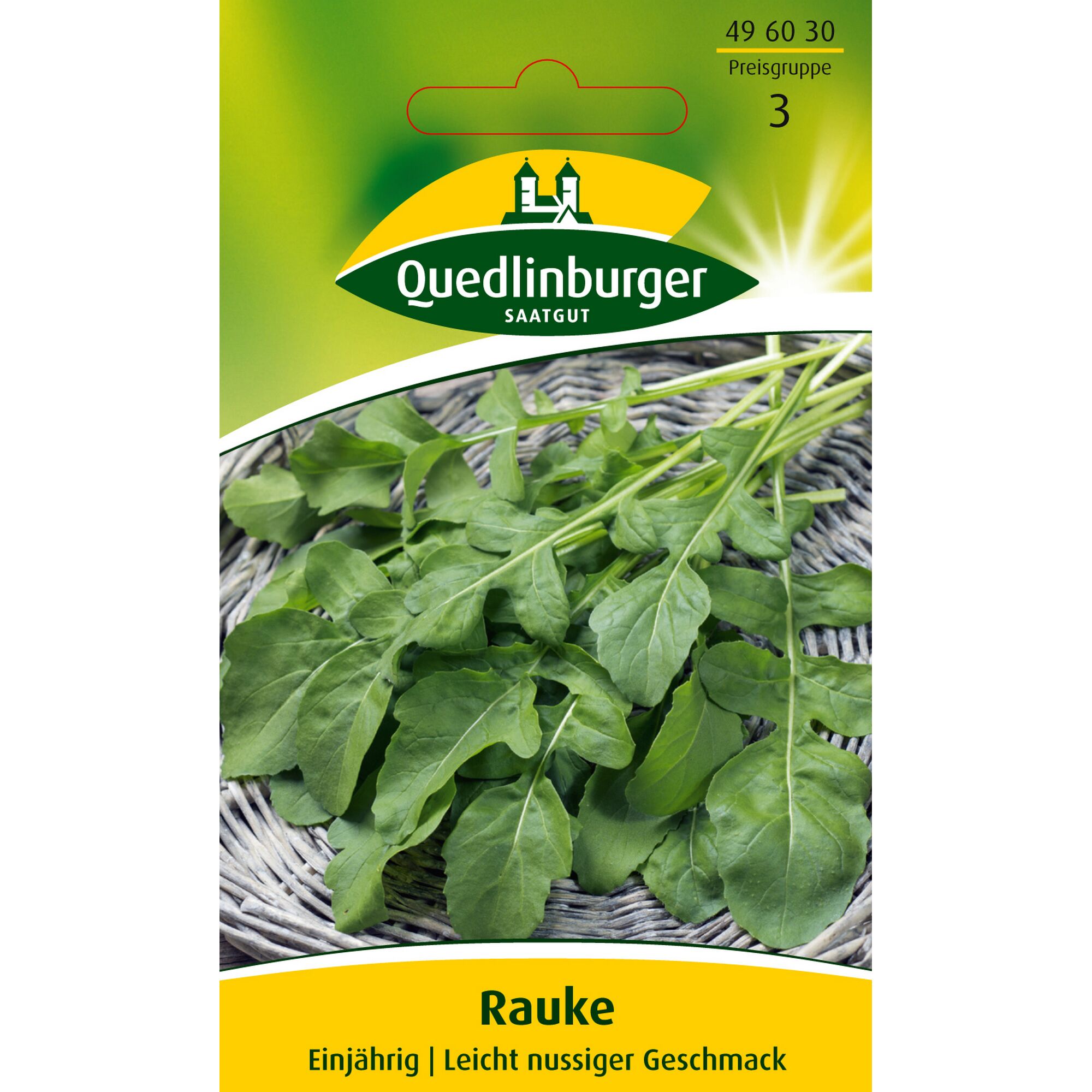 Grüne Rauke-Blätter auf einem geflochtenen Untergrund.