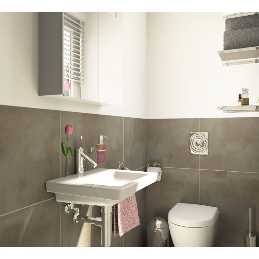 Badezimmer mit Waschbecken, Toilette und Handtuchhalter