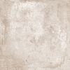 Beige geflieste Fläche mit Rissen