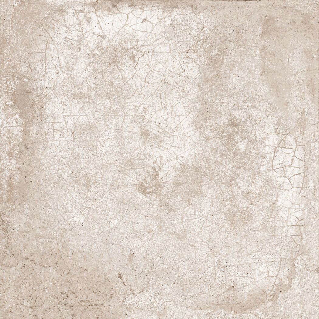 Beige geflieste Fläche mit Rissen