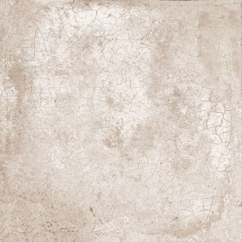 Beige geflieste Fläche mit Rissen