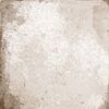 Beige geflieste Fläche mit Rissen