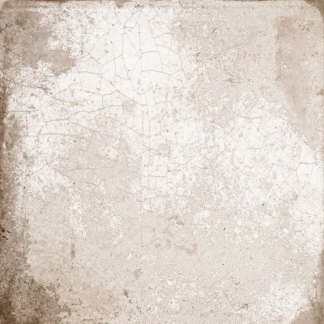 Beige geflieste Fläche mit Rissen