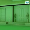 Grüne Hausfassade mit Riss