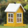 Gelbes Futterhaus Sara mit Vogelfutter