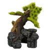 Künstlicher Bonsai auf Steinen