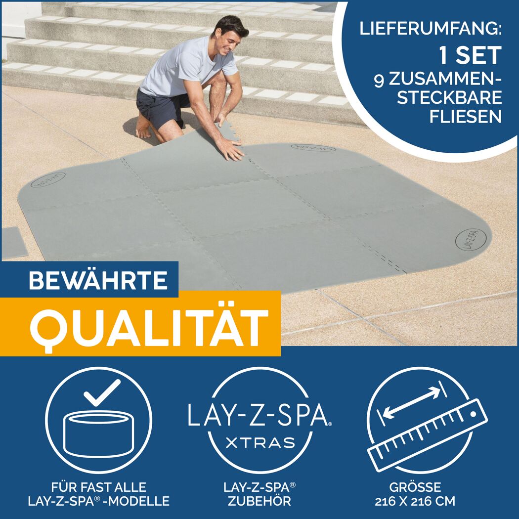 Person legt graue Lay-Z-Spa Bodenfliesen zusammen.