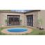 Runder Pool im Garten mit Zugang zum Haus