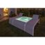 Pool mit Beleuchtung und Liegen im Garten