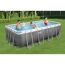 Familie im rechteckigen Aufstellpool von Bestway