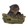 Wasserspeier Otter auf Baumstamm