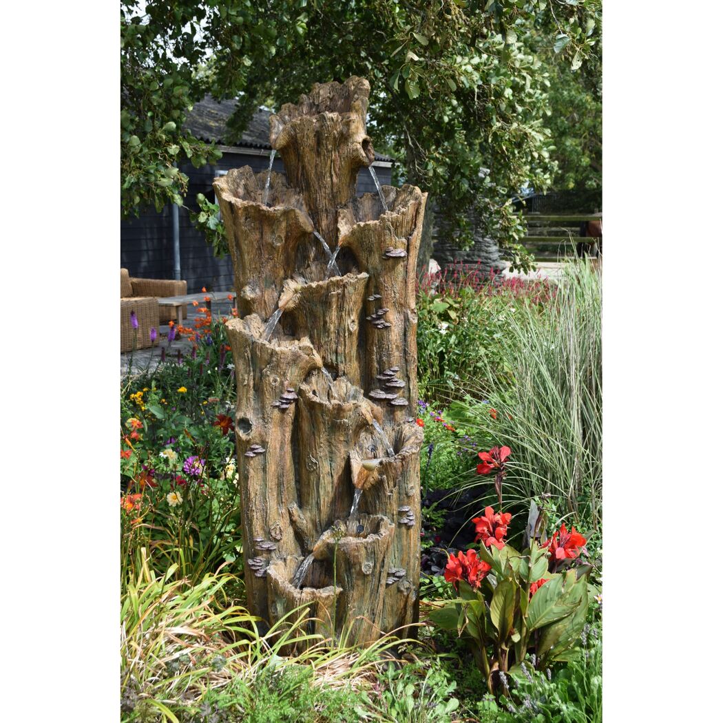 Dekorativer Wasserspielbrunnen in Baumstamm-Optik
