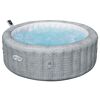 Runder grauer Whirlpool mit Sprudelwasser