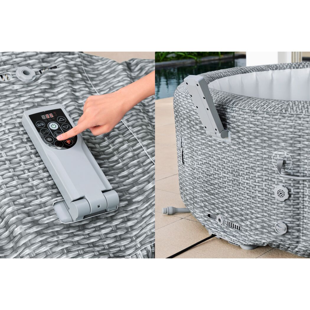 Person steuert Whirlpool mit Fernbedienung