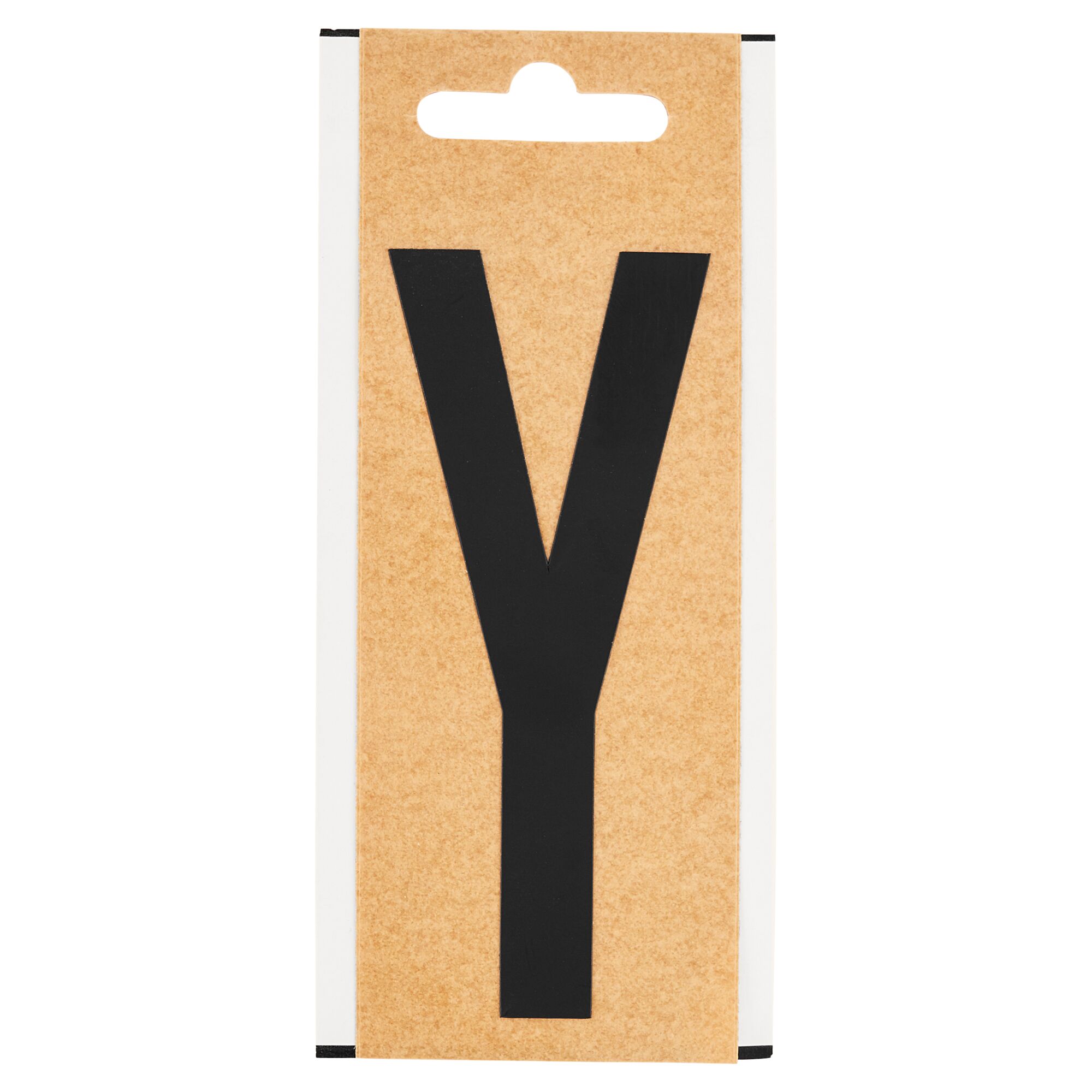 Schwarzer Folienbuchstabe Y auf braunem Karton