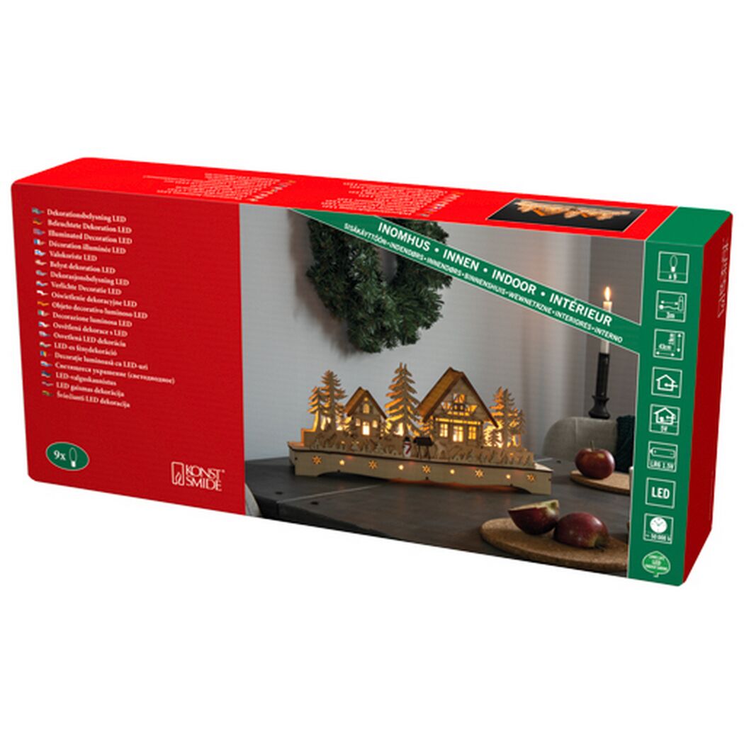 Beleuchtetes Weihnachtsdorf aus Holz