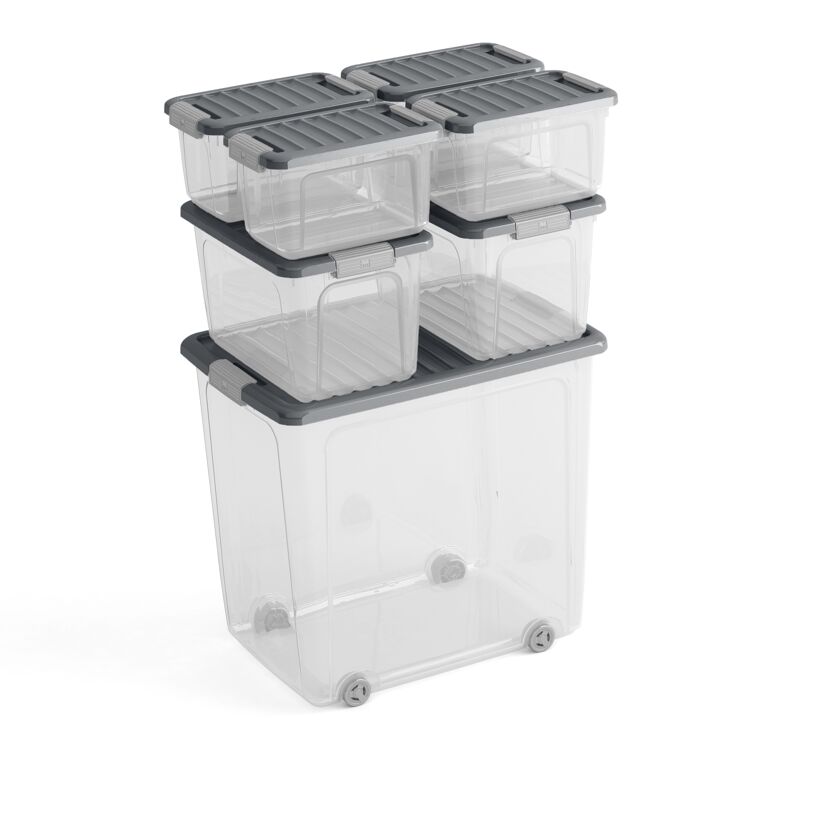 Mehrere transparente Aufbewahrungsboxen mit grauen Deckeln.