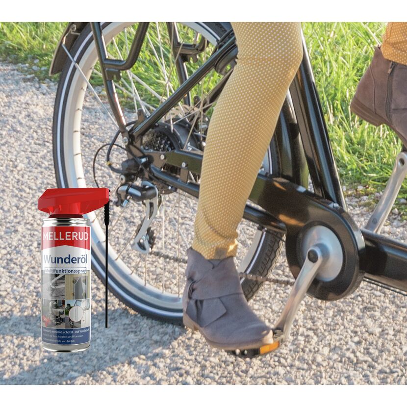 Mellerud Wunderöl Multifunktionsspray neben Fahrrad