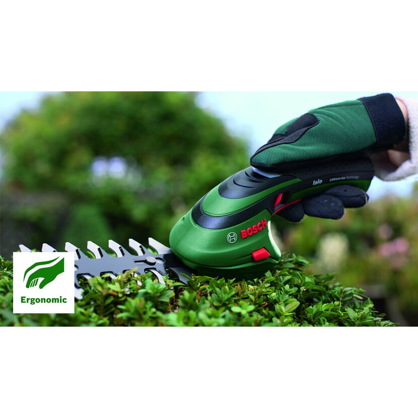 Person schneidet Hecke mit Bosch Isio Grasschere