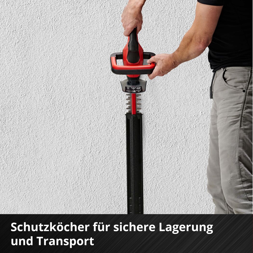 Person steckt Heckenschere in Schutzköcher