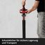 Person steckt Heckenschere in Schutzköcher