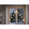 LED Lichterkette mit Sternen am Fenster
